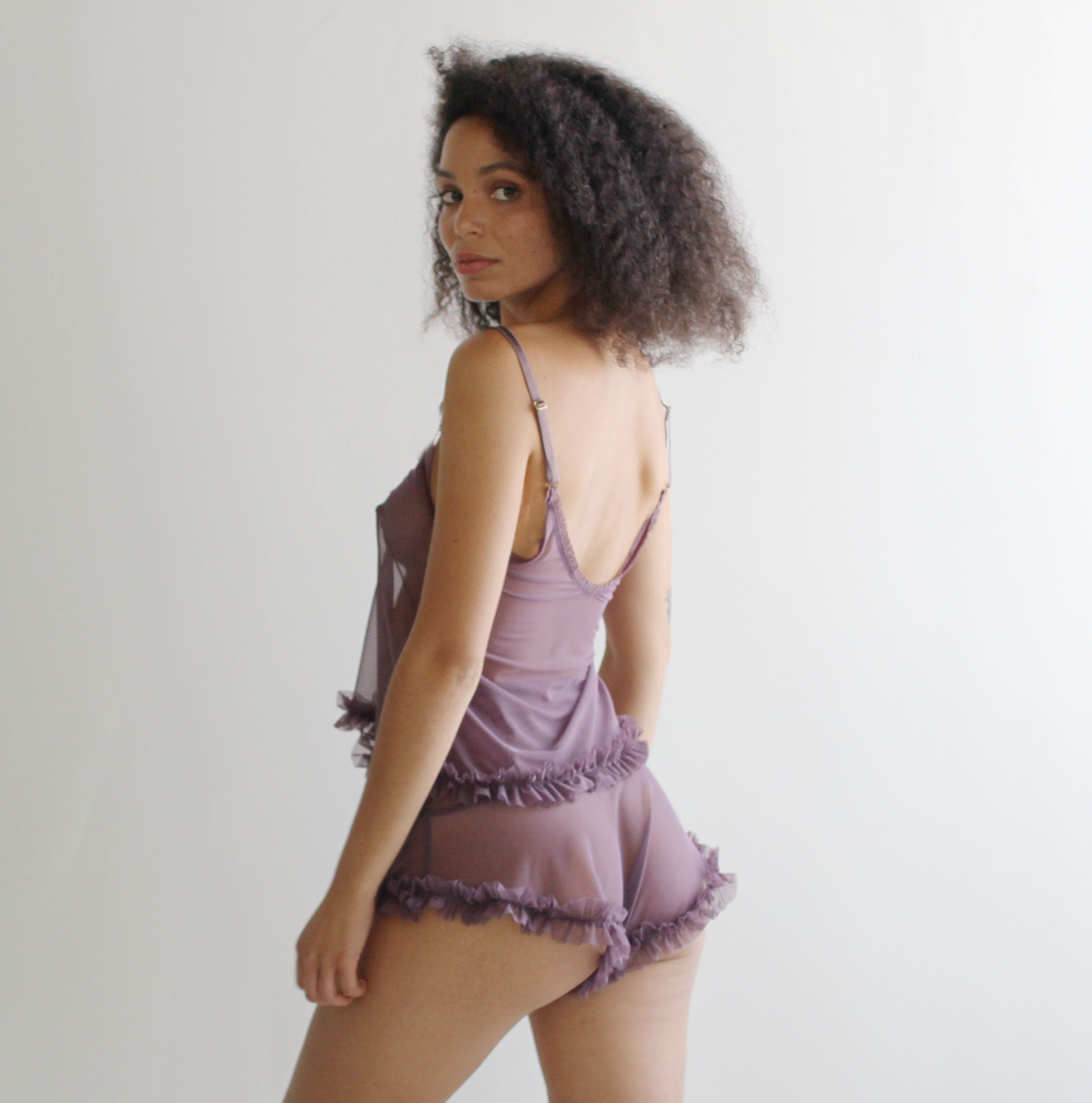 Sheer lingerie set including cropped ruffled camisole and high waisted tap pants